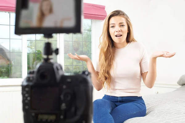 Female Vlogger Recording Broadcast In Bedroom — Stok Foto