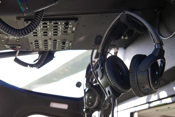 Close Up Of Headsets In Helicopter Cockpit — Stock Photo, Image