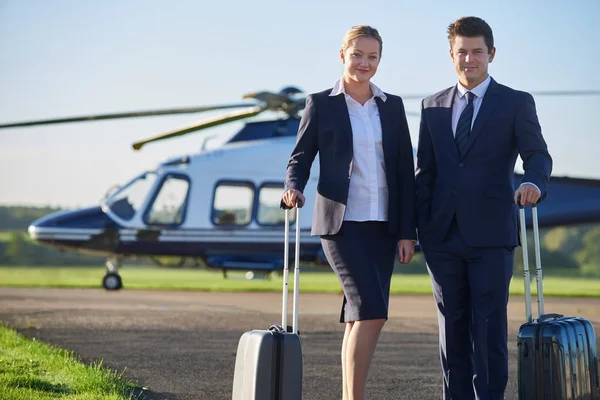 Portrait Of Businesswoman And Businessman Standing In Front Of H — Stock Photo, Image