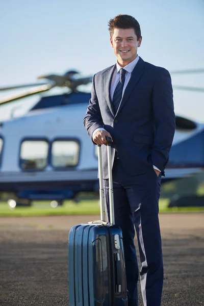 Portrait Of Businessman Standing In Front Of Helicopter — Stock Photo, Image