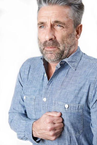 Studio Shot Of Mature Man Suffering With Stomach Pain — Stock Photo, Image