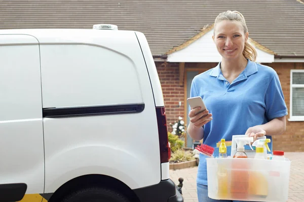 Portrait Of Woman Running Mobile Cleaning Business Checking Text — Stock Photo, Image