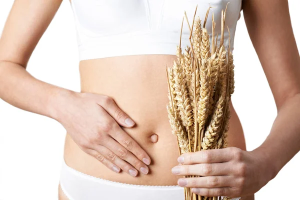 Close Up Of Woman Wearing Underwear Holding Bundle Of Wheat And — Stock Photo, Image