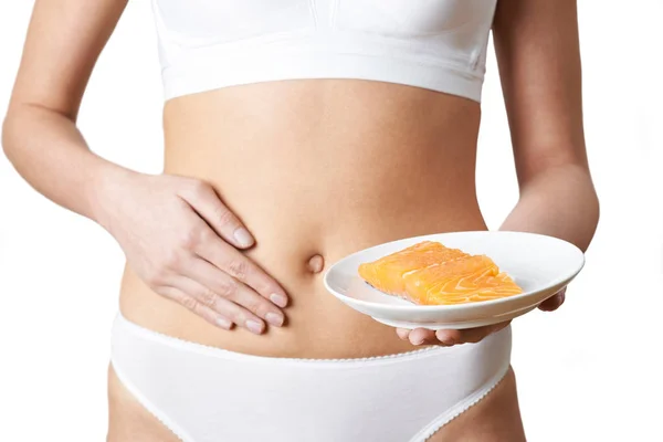 Close Up Of Woman In Underwear Plate Of Salmon And Touching Stom — Stock Photo, Image