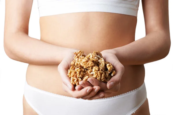 Close Up Of Woman Wearing Underwear Holding Handful Of Walnuts — Stock Photo, Image