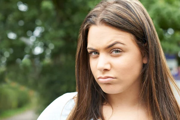 Head And Shoulders Portrait Of Serious Teenage Girl — Stock Photo, Image