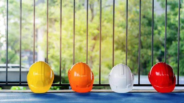 Quality construction teamwork. Safety concern for engineering or building work site or plant. Wearing helmet and protective equipment can safe contractor life in industrial work or plant. copy space