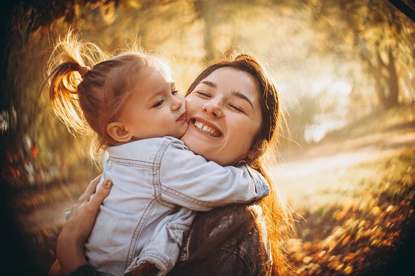 Young Happy Smiling Mom Her Little Daughter Arms Hugging Kissing — Stock Photo, Image