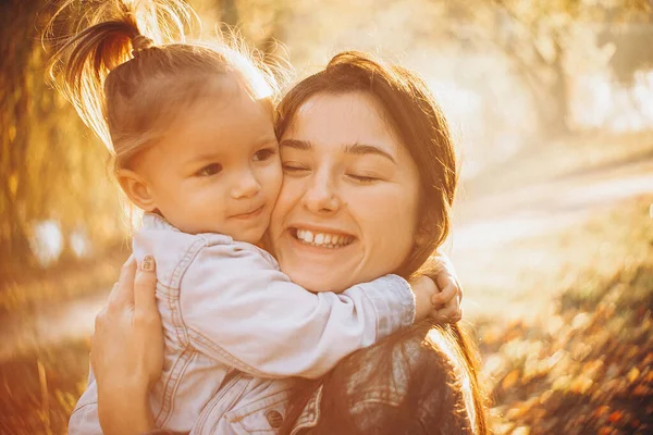 Young Happy Smiling Mom Her Little Daughter Arms Hugging Kissing — Stock Photo, Image