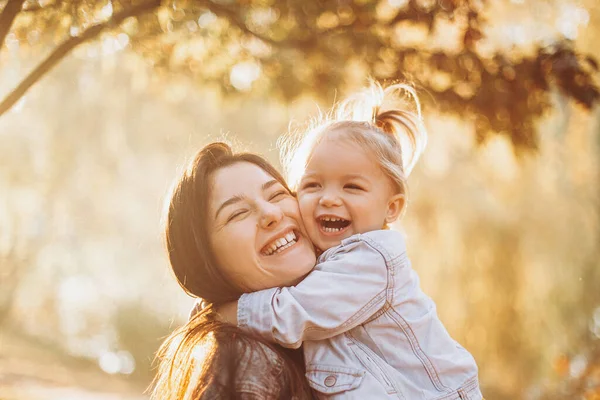 Young Happy Smiling Mom Her Little Daughter Arms Hugging Kissing — Stock Photo, Image