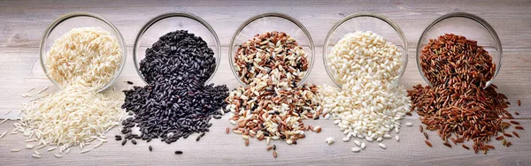Assortment of various rices: basmati, black rice, mix long grain, arborio and red rice.