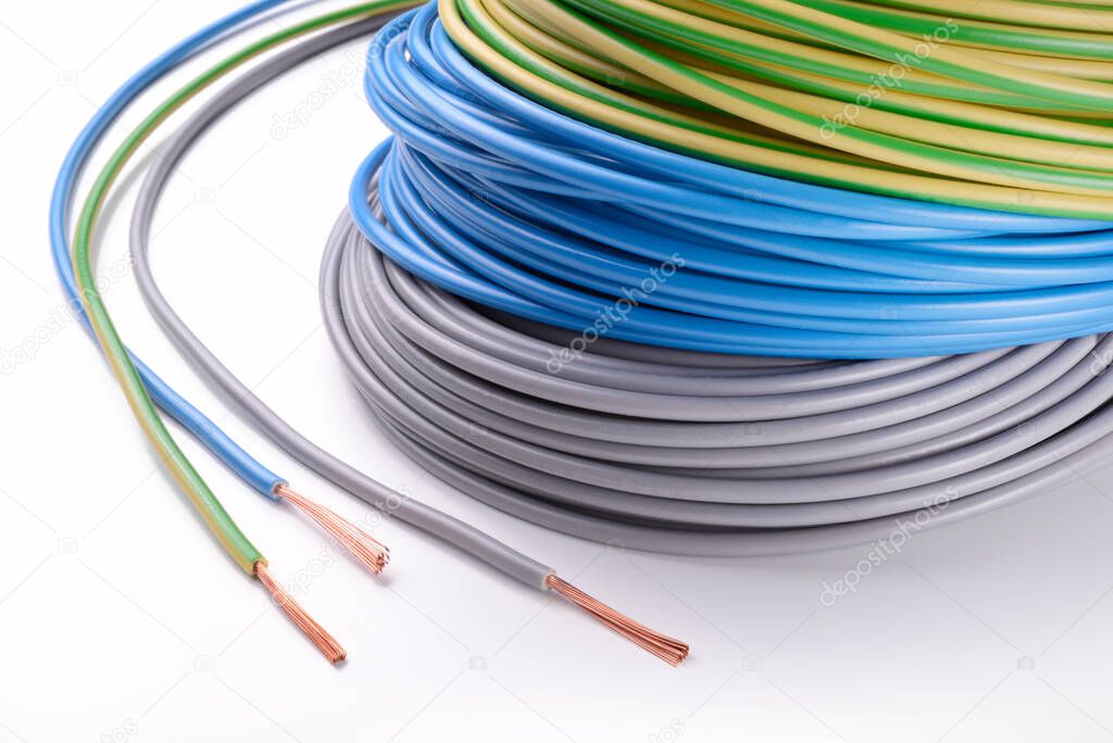 Electrical wires: phase, neutral and ground on white background.