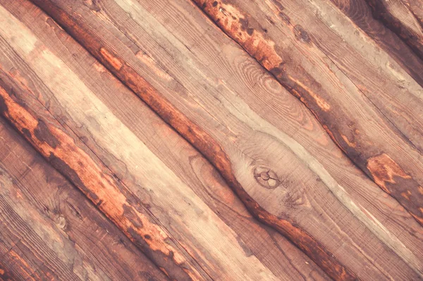 Wood background. Background from boards and logs.