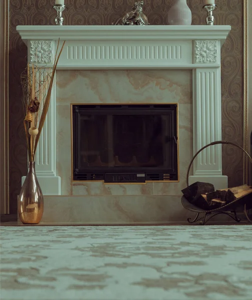 Living room with fireplace, carpet and candles in candlesticks.