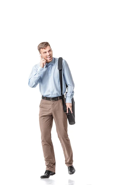 Homem de negócios correndo e falando por telefone — Fotografia de Stock
