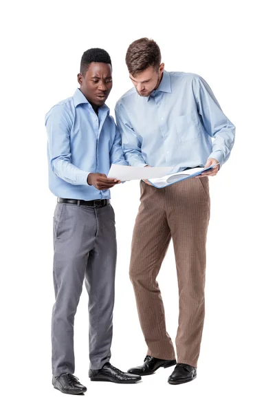 African-American and Caucasian businessman looking at documents — Stock Photo, Image