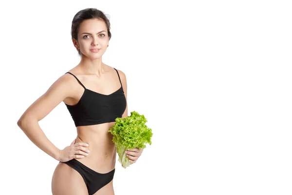 Healthy woman with salad leaves — Stock Photo, Image