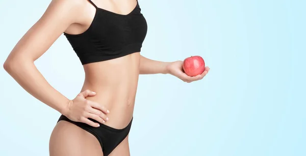 Beautiful young healthy woman with a red Apple. — Stock Photo, Image