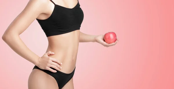 Beautiful young healthy woman with a red Apple. — Stock Photo, Image