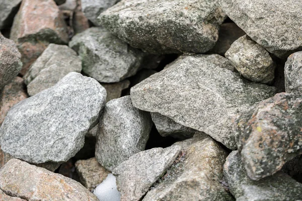 Textura de piedra, fondo, piedras grises en el parque — Foto de Stock