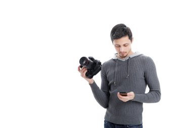 profesyonel fotoğrafçı seyir telefon dijital SLR dijital fotoğraf makinesi ile