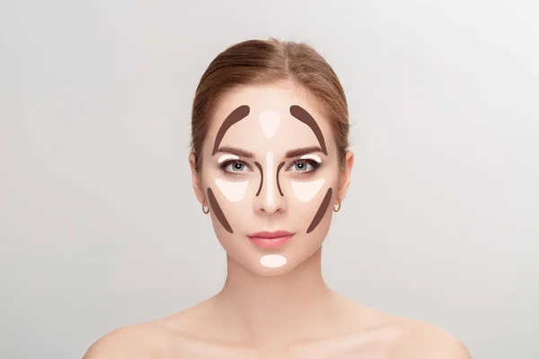 Contacto. Maquiagem rosto de mulher no fundo cinza. Profissional — Fotografia de Stock