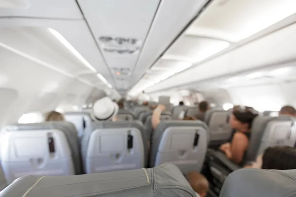 Hintergrund verschwommen: Passagier im Flugzeug — Stockfoto