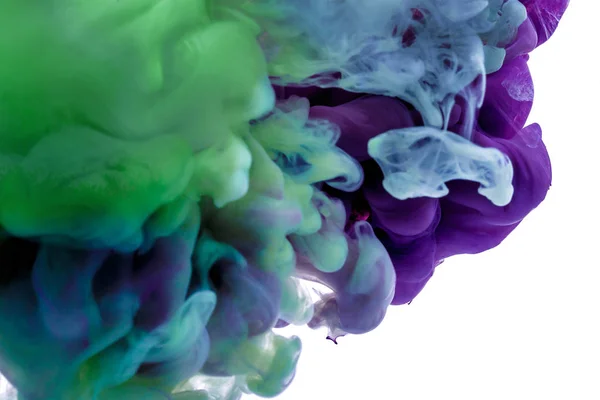 Färgglada bläck. lila blå droppe virvlande under vatten. Moln av bläck i vatten. abstrakt bakgrund — Stockfoto