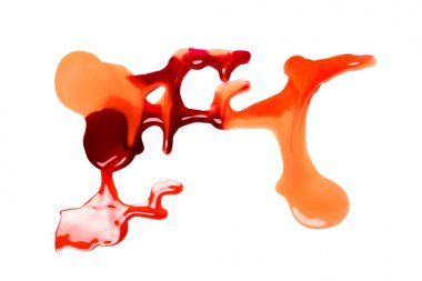 Beyaz arka plan üzerinde Renkli oje döküldü. Kırmızı ve sarı boya lekeleri.