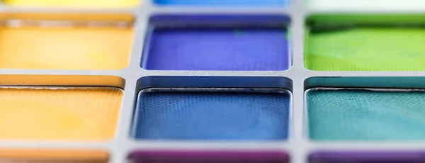 Pallet of colored eye shadows, texture. Shallow depth of field — Stock Photo, Image