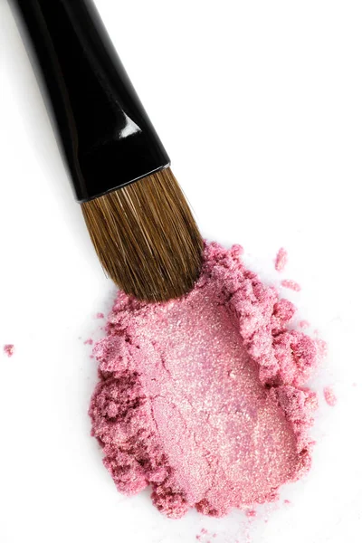 Sombra y cepillo rosa roto aislado sobre fondo blanco — Foto de Stock