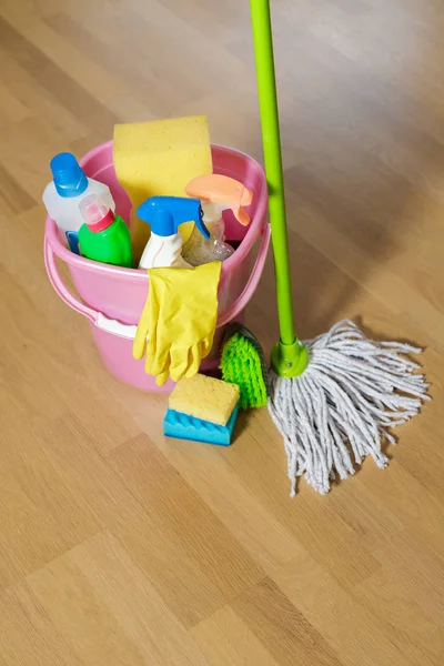 Plastic bucket with cleaning product at home — Stock Photo, Image