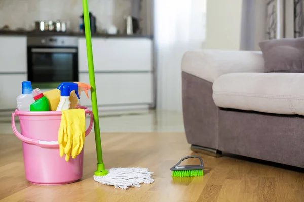 Plastic bucket with cleaning product at home — Stock Photo, Image