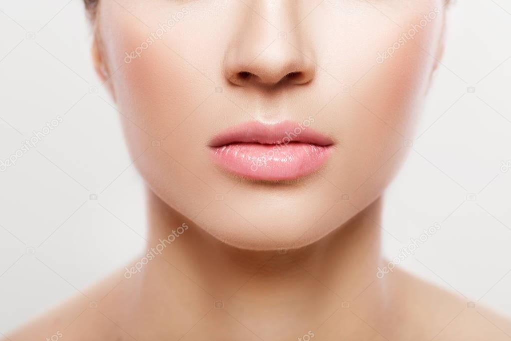 womans lips with natural make up