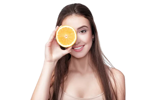 Woman with orange on white background — Stock Photo, Image