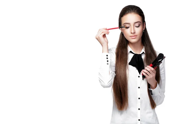 Make-up artist holding makeup brush — Stock Photo, Image