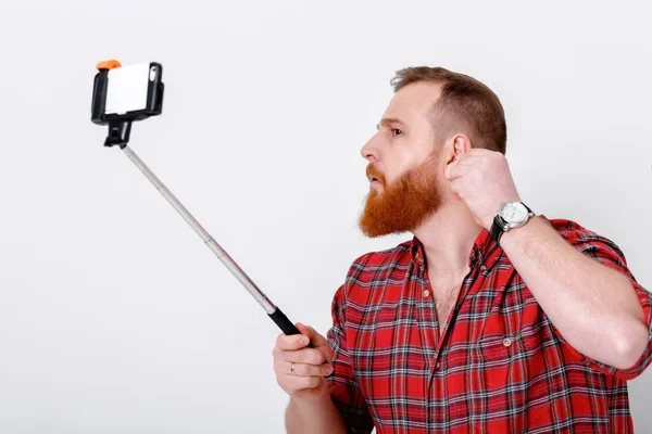 stock image man makes selfie on phone