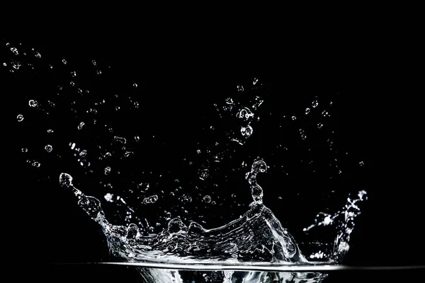 Water splash on black — Stock Photo, Image