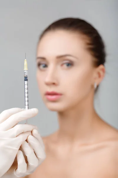 Woman getting cosmetic injection — Stock Photo, Image