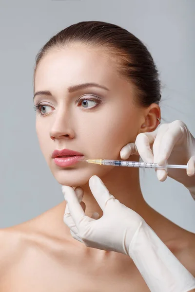 Woman getting cosmetic injection — Stock Photo, Image