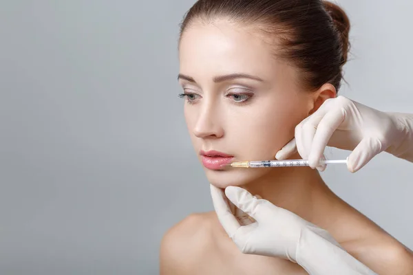 Woman getting cosmetic injection — Stock Photo, Image