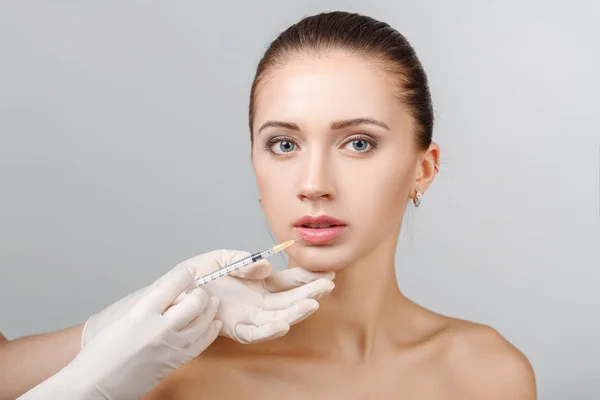 Woman getting cosmetic injection — Stock Photo, Image