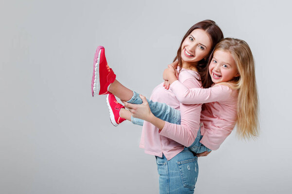 mother and daughter having fun together