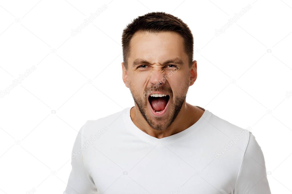 man in casual white shirt shouting