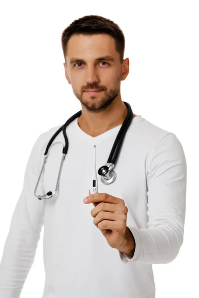 Man with stethoscope is showing a thermometer — Stock Photo, Image