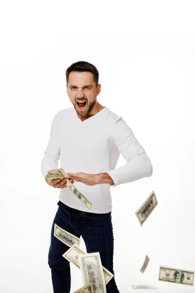 Hombre tirando billetes de dinero — Foto de Stock