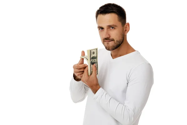 Człowiek posiadający banknoty pieniądze — Zdjęcie stockowe