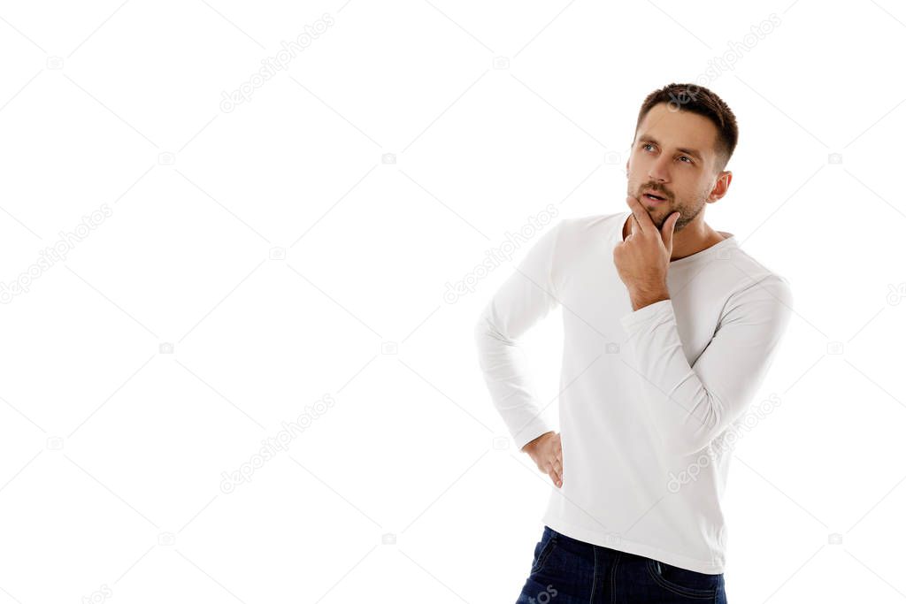 bearded man in casual white shirt asking questions