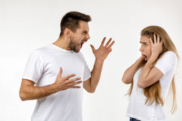 angry man shouting at girlfriend