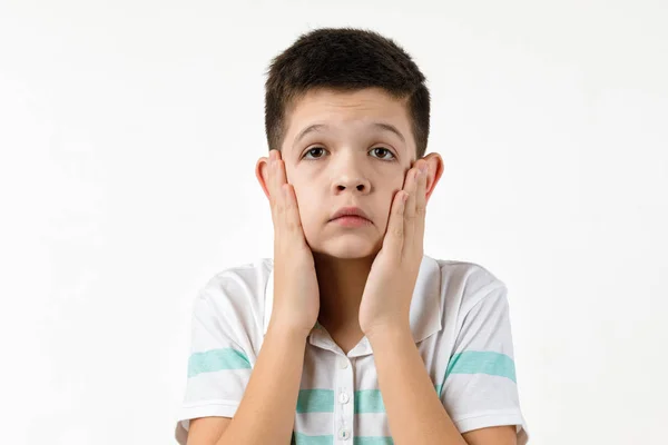Offended sad little child boy in striped t-shirt — Stock Photo, Image